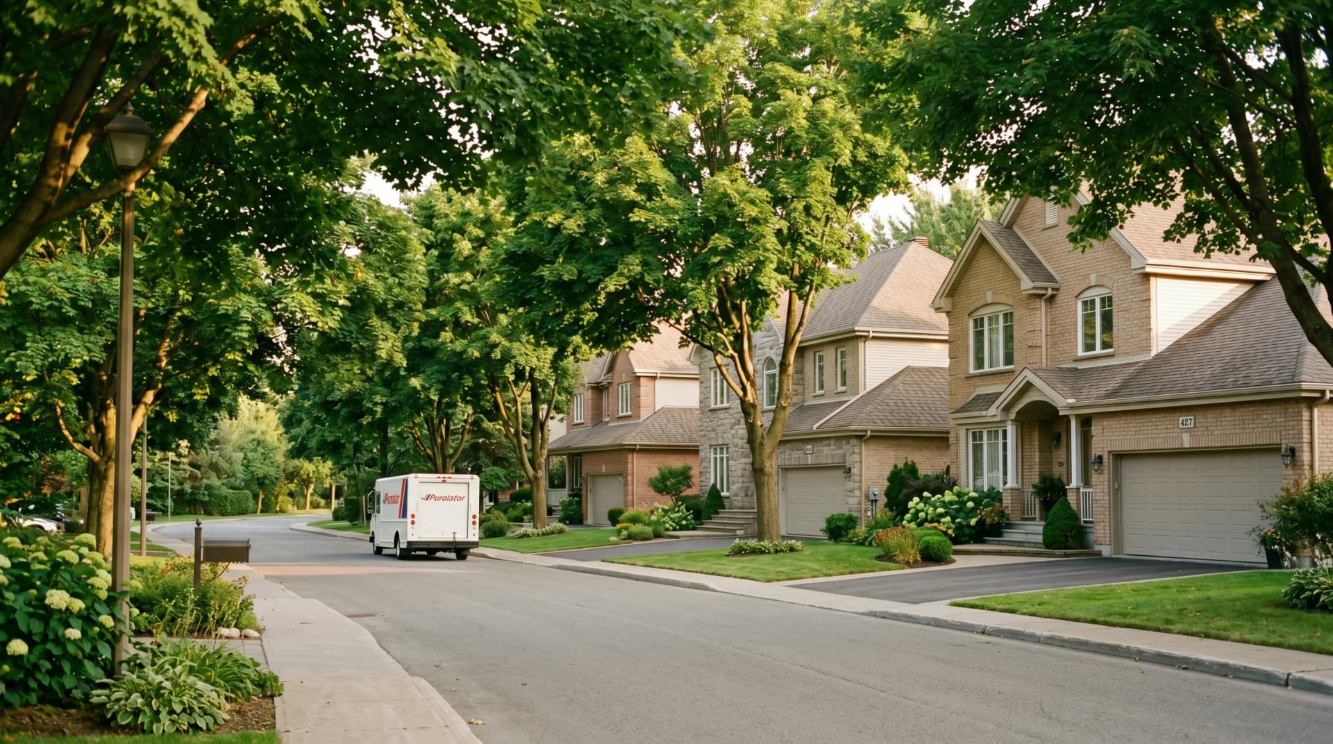 A quiet Saint-Lambert or Brossard residential street in the Longueuil agglomeration with 1990s beige-brick two-story homes, attached double-garages and mature maples forming an arching late-summer canopy — Distinctive Form serves Longueuil
